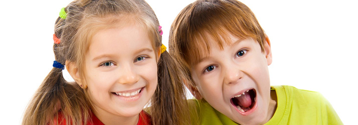 Two children smiling