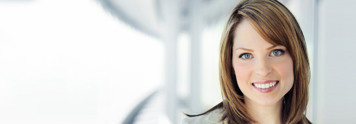 A woman smiling