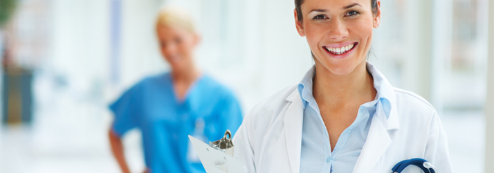 A person in a white coat with a stethoscope